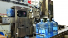Photo of new 5 gallon bottled water washer, filler, and capper.